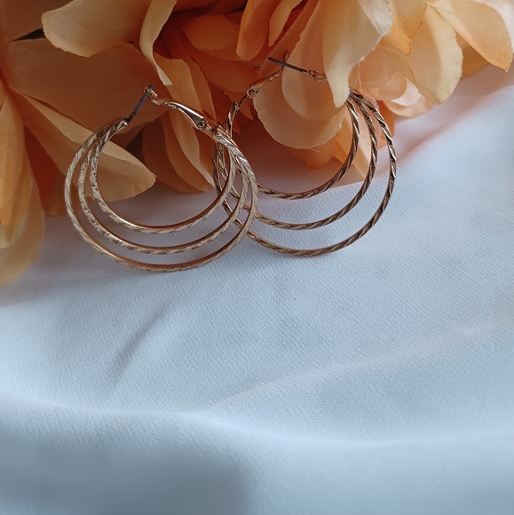 Golden Spiral Hoop Earrings - Picture 7 of 15